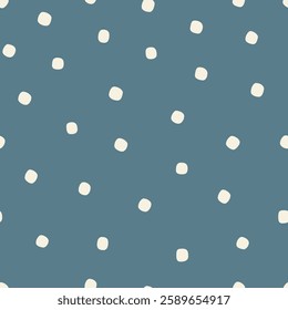 Simple and minimalist polka dot pattern with irregular, hand-drawn dots on a muted teal background. Suitable for both textiles and decorative applications.