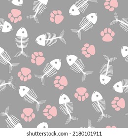 Simple minimalistic pattern - cat paws and skeletons of fish on a gentle gray background