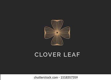 Simple modern gold clover leaf plant seal logo design