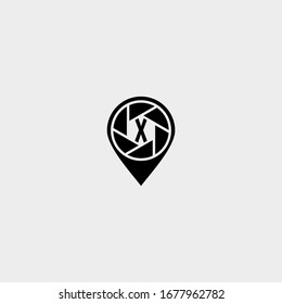 simple modern pin with capture and X logo letter inside. creative logo letter design.
