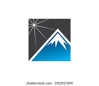 simple mountain with star or sun burst rays