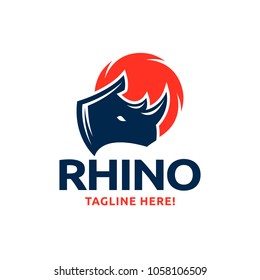 Simple and original logo with the abstract rhino head image on red sun background.