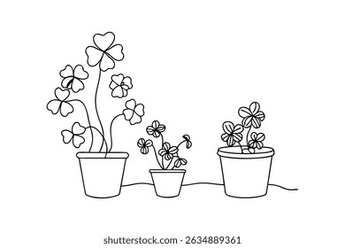 Simple outline illustration of three potted shamrocks in black and white drawing for design
