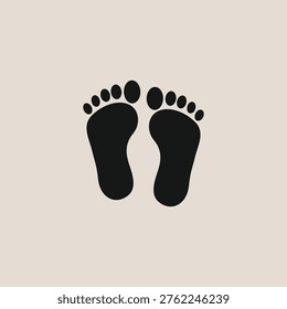 Simple pair of baby footprints on soft beige background. Dark silhouettes show tiny toes and heels clearly. No emotion, just gentle symbol of childhood and growth. Perfect for parenting, baby