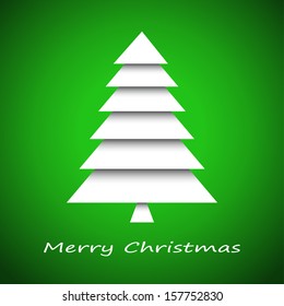 Simple paper Christmas tree on green background