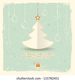 Simple papel árbol de Navidad con estrella y adornos colgados en un fondo verde pálido y afligido.