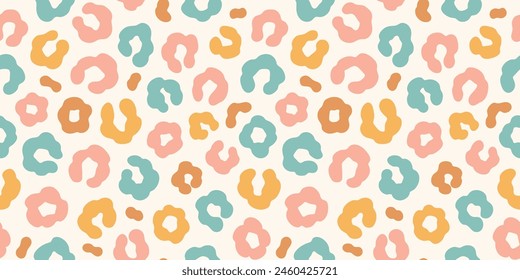 Simple pastel leopard skin print seamless pattern. Cheetah skin flat style background in retro boho colors. Hand drawn gender neutral pastel leopard print background. Cute and fun kids safari design.