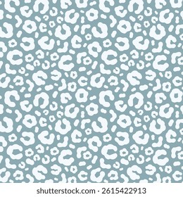 Simple pastel leopard skin print seamless pattern. Cheetah skin flat style background in retro boho colors. Hand drawn gender neutral pastel leopard print background. Cute and fun kids safari design.
