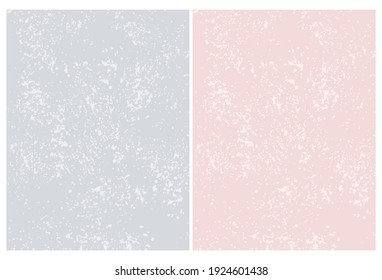 Sencillos fondos de vectores rosa y gris claro pastel con puntos y manchas irregulares. Grunge Layouts.