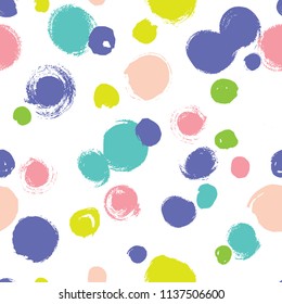 Simple pattern with bright polka dots. Seamless background for your design.
