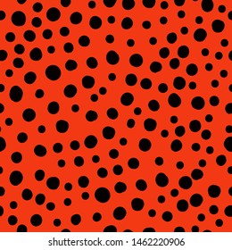A simple pattern of dots. Red background, black dots,spots. Print is well suited for textiles,banners and packaging,Wallpaper.