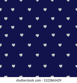 A simple pattern of hearts. Dark blue background, small gray silver hearts . Print is well suited for textiles, Wallpaper and packaging.