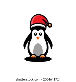 Simple penguin in a christmas hat in white background , vector logo design template