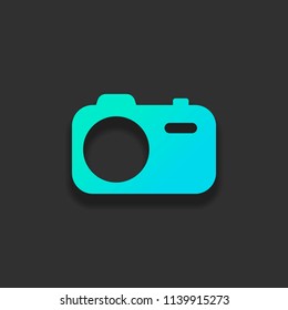 Simple photo camera. Technology icon. Colorful logo concept with soft shadow on dark background. Icon color of azure ocean