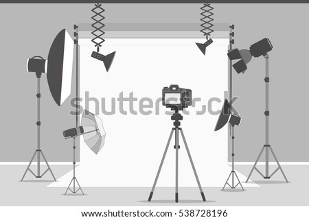 Simple photo studio. White background with lights and cameras.