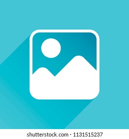 Simple picture icon. Gray icon with long shadow in bottom left corner on blue background