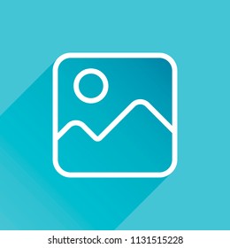 Simple picture icon. Linear symbol, thin outline. Gray icon with long shadow in bottom left corner on blue background