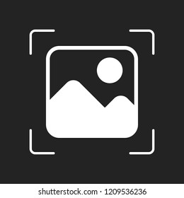 Simple picture icon. White object in camera autofocus on dark background