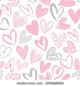 Simple pink hand drawn hearts. Love seamless pattern on white