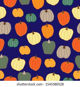 Simple pumpkin pattern. Blue background, pumpkins of different colors. The print is well suited for textiles, Wallpaper, banner and packaging.