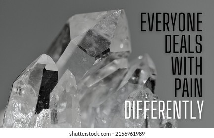 simple quote design reads "Everyone deals with pain differently". with the basic color of grayscale and black and white on the letters