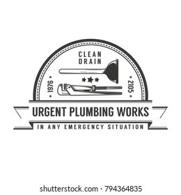 Simple retro logo plumbing services with plunger and pipe wrench.