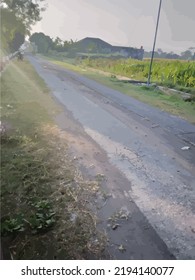 Simple road with fields around it