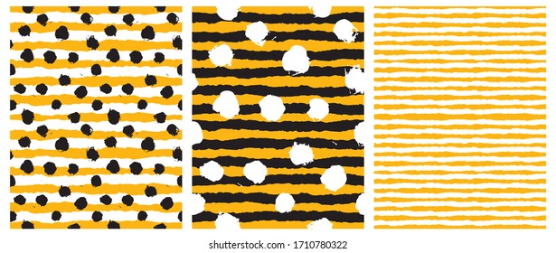 Simple Rough Dots and Stripes Seamless Vector Patterns. White Hand Drawn Brush Dots Isolated on a  Striped Background. Infantile Style Geometric Repeatable Print. White Stripes on a Yellow Layout. 