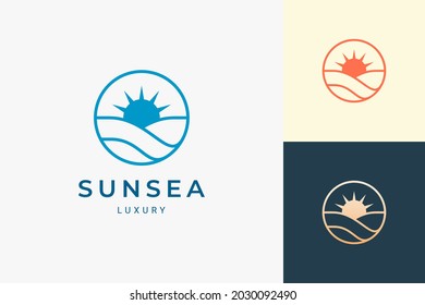 Simple sea or surf logo with ocean wave and sun in circle shape
