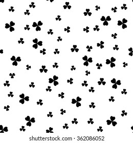 Simple seamless black and white St. Patrick's day background with clover leaves.