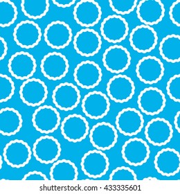 Simple seamless blue pattern with rings. Wallpaper with blue pattern. Blue background with white rings