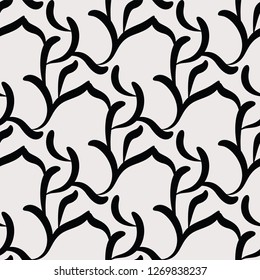 Simple seamless leaves pattern. Monochrome black leaves on beige background