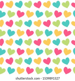 Simple seamless pattern with colorful hearts. Vector background.