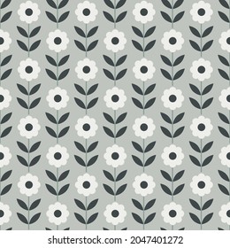 Simple seamless pattern design with daisy flowers and green leaves.