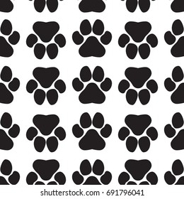 Simple seamless pattern with dogs paw prints. Vector illustration for your graphic design.