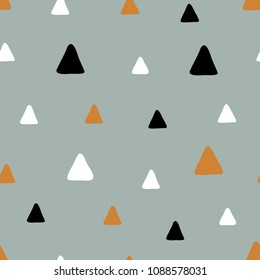 Simple seamless pattern with hand drawn triangles. Scandinavian minimal style design. Vector background image for fabric, textile, scrapbook, baby shower, gift wrapping paper