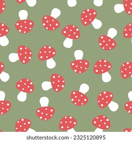 Simple seamless pattern with mushrooms on a green background.Vector graphics.