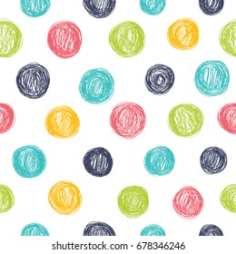 Simple seamless pattern with polka dots in bright colors.