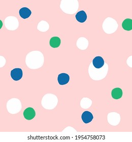 Simple seamless pattern with round spots painted with a watercolor brush. Cute vector illustration.