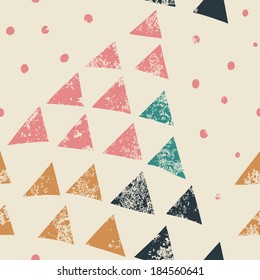 Simple seamless pattern with triangles and polka dots.