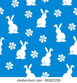 Simple seamless pattern with white rabbit on blue background