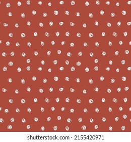 Simple seamless red dots Memphis pattern. Modern minimalistic dotted pattern. Red and white polka dots designed for print and web. Earthy color texture.