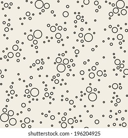 Simple seamless texture with circles. A vector