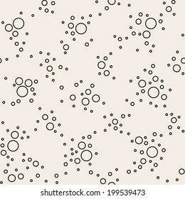 Simple seamless texture with circles. A vector