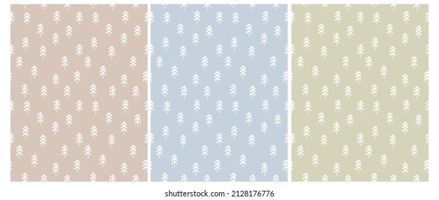 Simple Seamless Vector Patterns with White Hand Drawn Christmas Trees on a Light Blue, Beige and Pale Green Background. Winter Forest Print with Infantile Style Sketched Pine Trees.