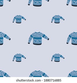 Simple seamless winter pattern with wool sweater silhouettes. Blue palette christmas backdrop. Flat vector print for textile, fabric, giftwrap, wallpapers. Endless illustration.