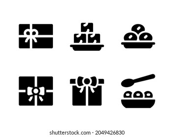 Conjunto simple de iconos sólidos vectoriales relacionados con Diwali. Contiene iconos como regalo, Gulab Jamun y más.