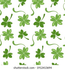 Simple shamrock and clover pattern with highlights. Spring green seamless pattern for St. Patrick's Day. Flat background, texture, wallpaper, wrapping paper, fabric, holiday print, hand-drawn texture.
