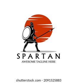 A simple silhouette logo of a spartan holding a spear against a sunset background