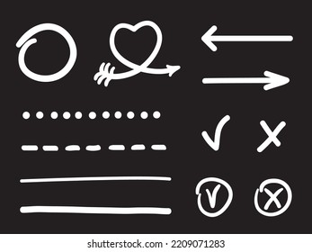Simple sketchy elements on a school blackboard. Hand drawn white objects on black. Abstract sketches in a drawing class. Freehand elements on a chalkboard. Back to school